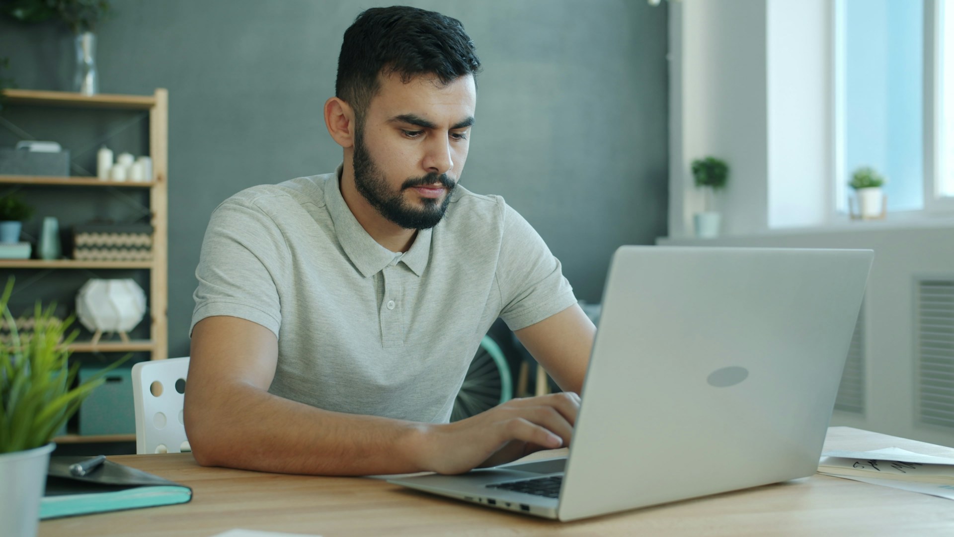 Auditor reviewing digital business documents on a computer
